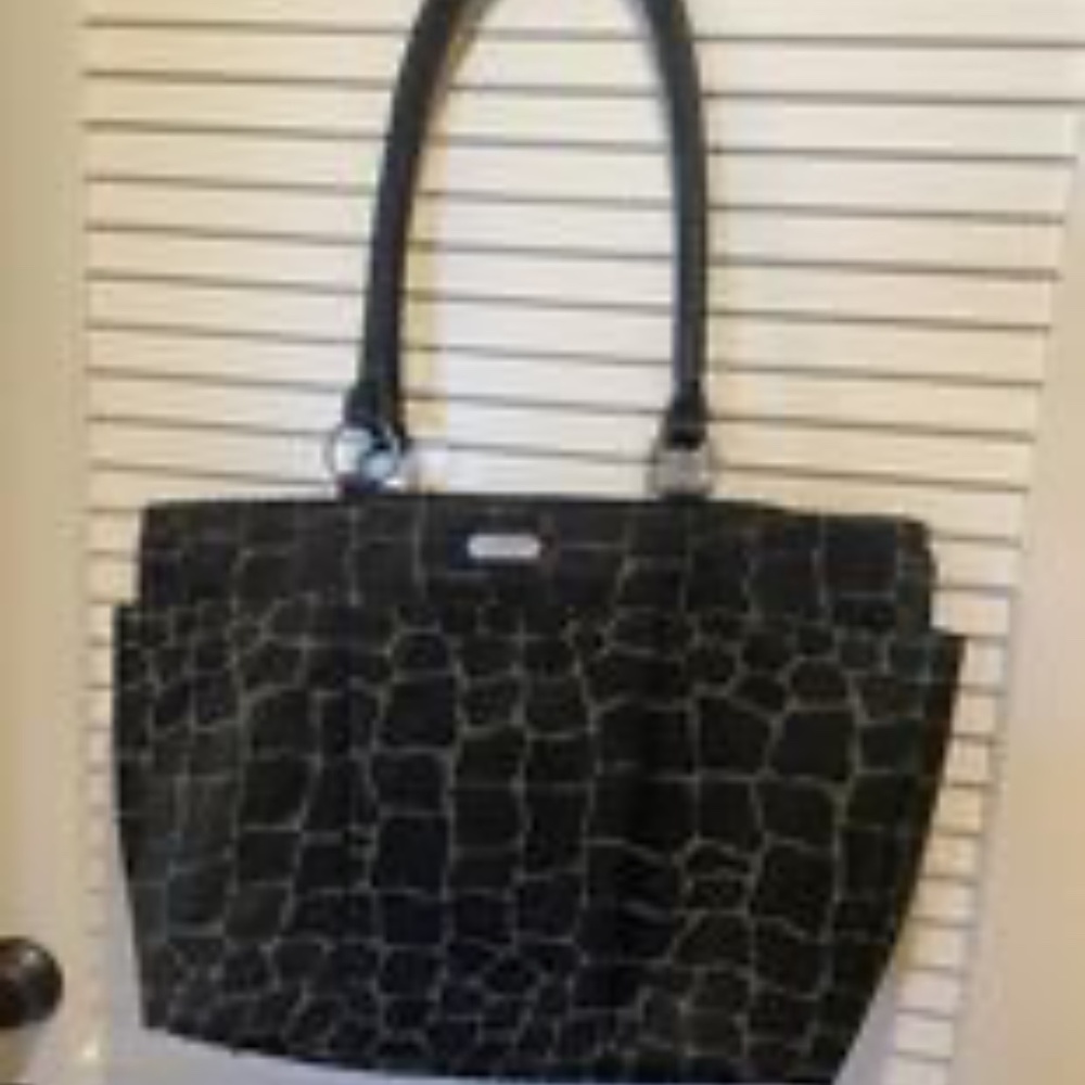 Baggallini nylon tote. Includes wristlet. Rare black giraffe print.